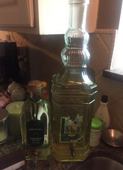 2 huge olive oil bottles