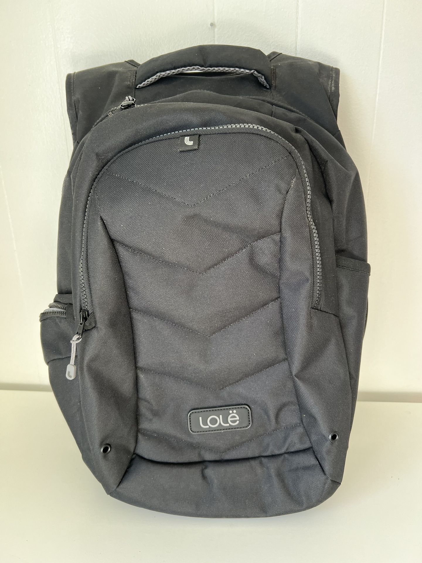 Lolë Black Quilted Laptop Backpack