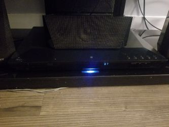 Surround sound and black glass console