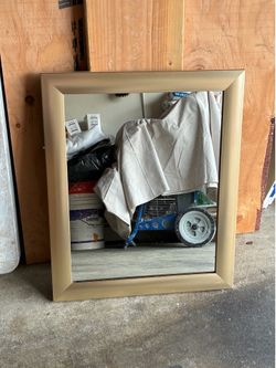 Gold rim mirror