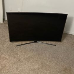 Curved Samsung Tv  Works Very Well. 