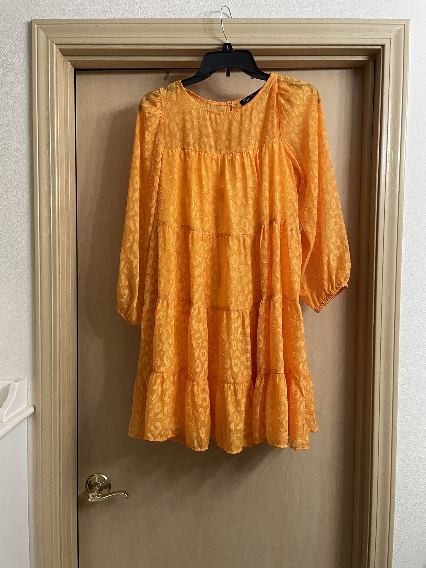 Adorable Women’s size small dress. Worn once. Yellow/orange color. Completely lined