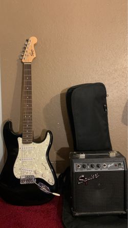 Fender Squire guitar and Amp w/ carrying bag.