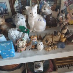 COLLECTION OF CAT FIGURINES