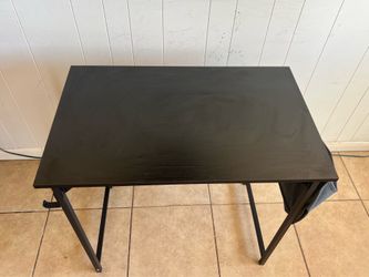 Small desk with pocket