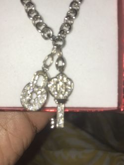 Silver Key And Lock With Diamonds In Them