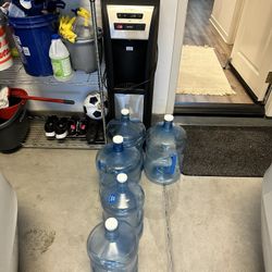 Culligan Water Cooler + 5 Bottles