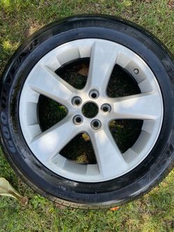 Size P235/55R18 99V Tire/rim brand new