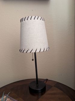 Nice-looking table lamp measures 19 inches.