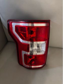 OEM  Used Left side haligen tail light 2018-2020 Ford F 150