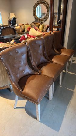 4 lovely leather tufted chairs