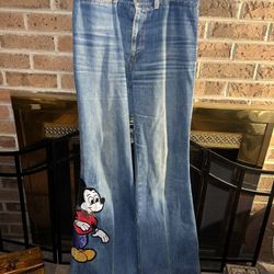 Mickey Mouse 27” long patch on bottom of fun flare wide bottom 33” waist jeans 