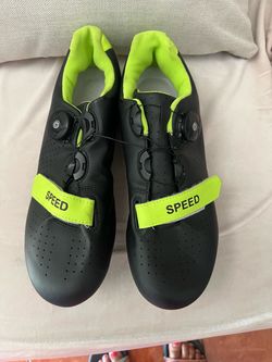 Speed branded black and neon green cycling shoes,