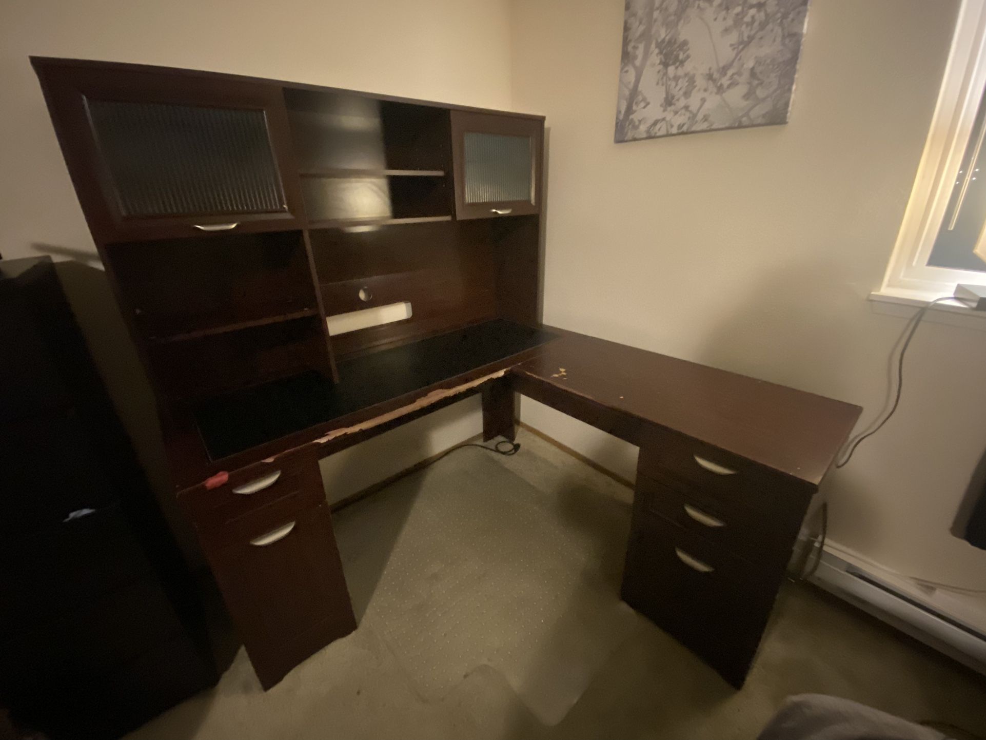 Large L-shaped desk with plenty of storage space