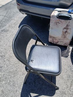 Two Black folding  Chairs