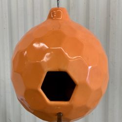 Orange comb ceramic birdhouse