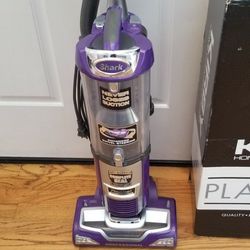 NEW cond  SHARK Vacuum , WITH ATTACHMENTS  , AMAZING POWER SUCTION. , WORKS EXCELLENT  , IN THE BOX 
