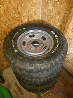285/70/17 BFGOODRICH All-Terrain T/A 3 tires and rims