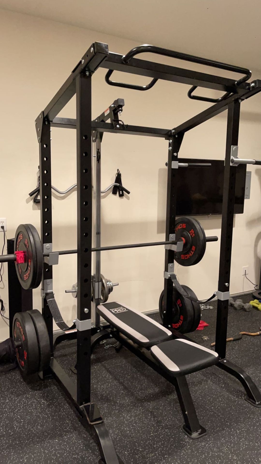 weight lifting rack with cable attachment