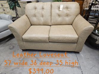 Loveseat Leather We are located at 2811 East Bell road. Another Time Around Furniture.