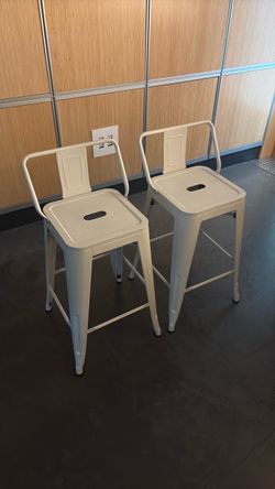 Two metal 24 inch counterstools