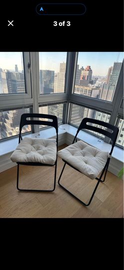 2 IKEA NISSE folding chairs