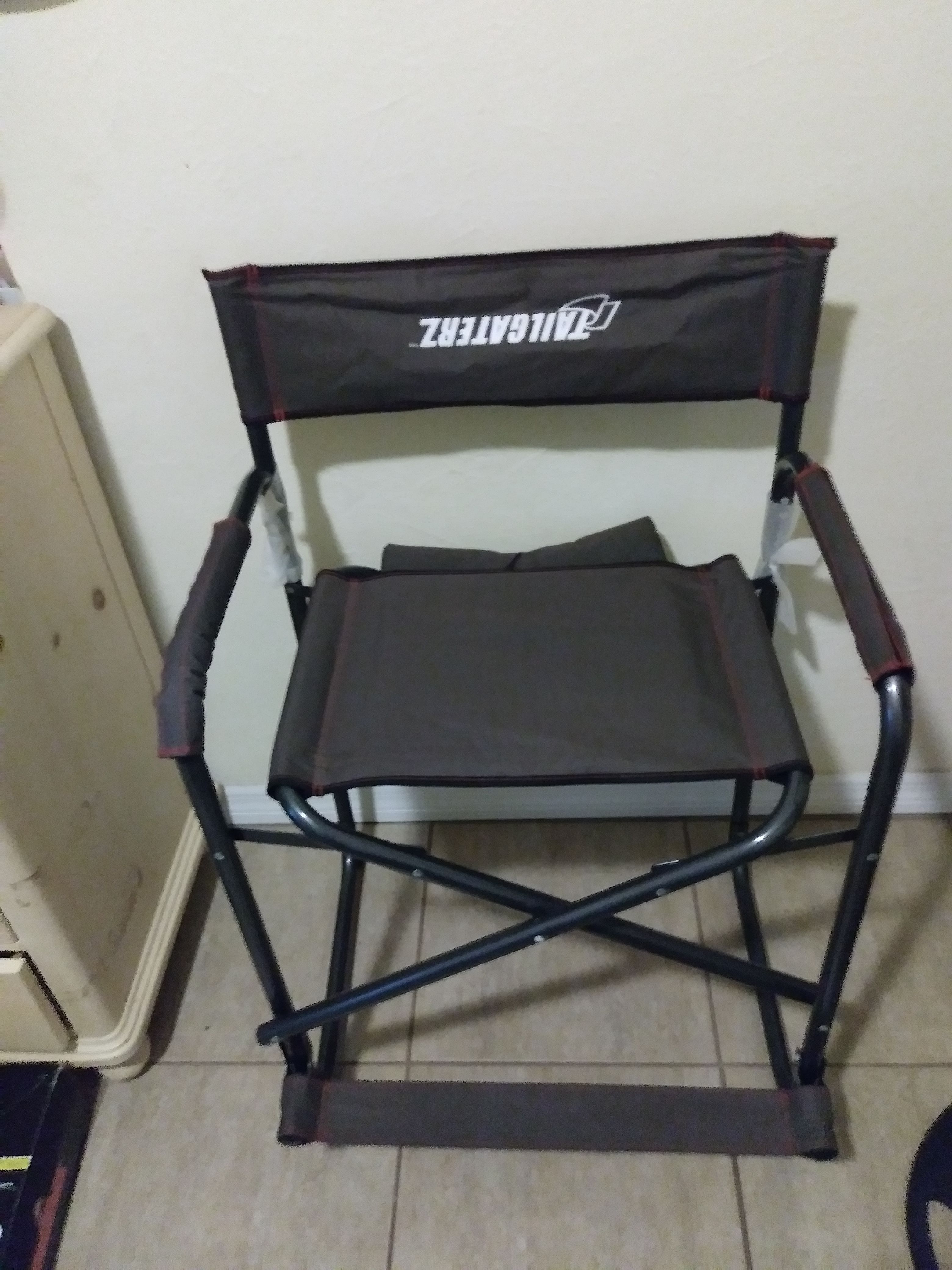 Folding chair with cushion made by Tailgaterz