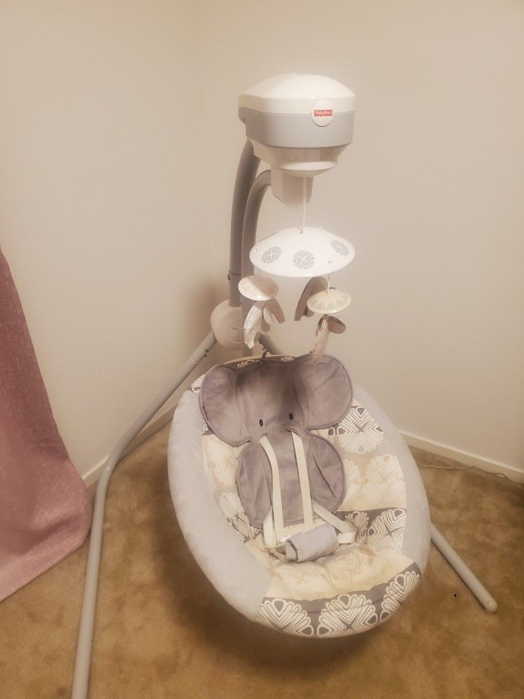 Fisher-Price Elephant Safari Swing N Cradle, Two Swinging Motions, Six Speeds Songs, 16 Songs, Plugs Into Outlet