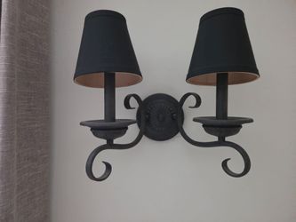 Sconces. Black iron, black shades.  110 v