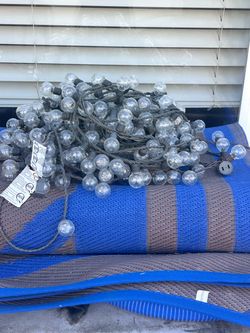 Patio lights, tiki torches, and tiki fluid