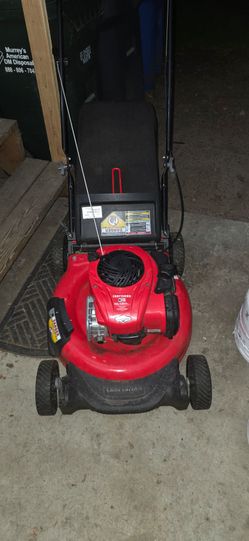 Craftsman mower, Briggs and Stratton engine, red