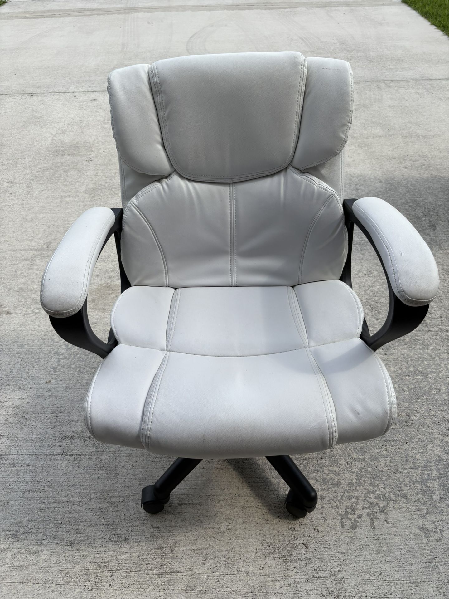 White leather swivel chair. Perfect condition.