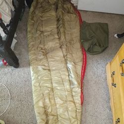 Vintage old school sleeping bag with stuff sack