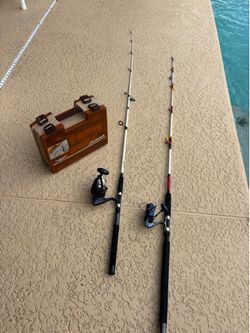 Two Shakespeare Fishing Poles 🎣 and a double sided tackle box