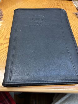Legal size folder could be faux leather.