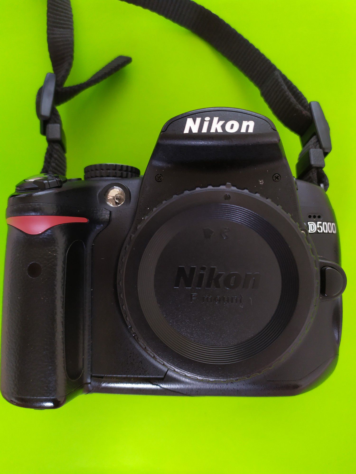 Nikon D D5000 12.3MP Digital SLR Camera - Body, batteries, charger, case, book