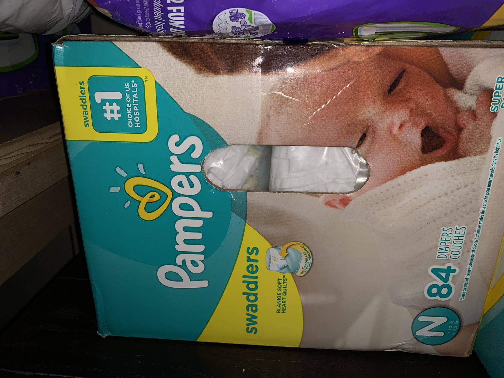 Pampers Swaddlers Newborn diapers 84 pack. Brand new box