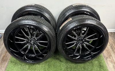 NEW 24x12 gloss black milled fuel wheels wrapped in arroyo 295/35r24 tires