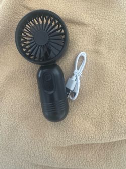 Little portable fan w charger