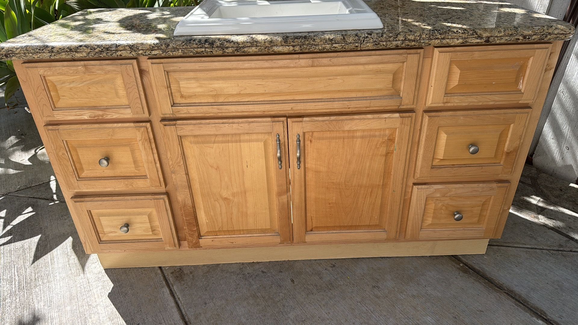 60” vanity with free granite countertop, sink and faucet.