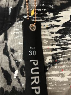 purple designer jeans