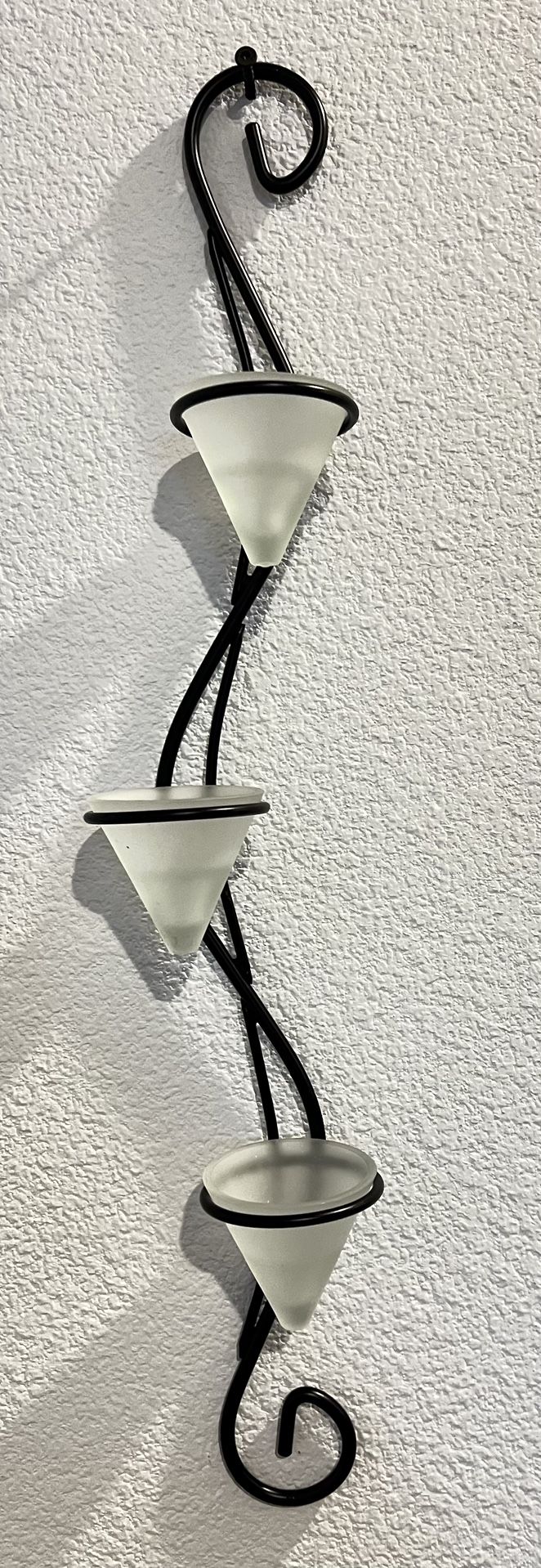 Wall mounted candle holder
