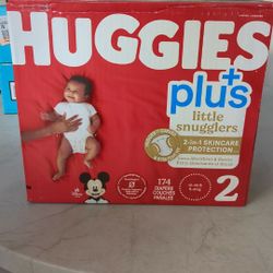 Huggies plus size 2 and Pampers size 1 baby diapers