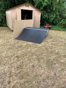 Skateboard / bicycle ramp