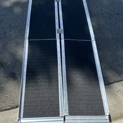 Brand new 6 foot aluminum folding ramp for 140