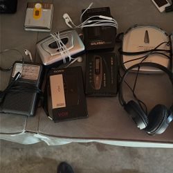 Lot Of Old Walkmans And Tape Players 