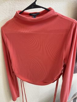orange long-sleeved blouse
