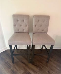 Set of two beige bar stools