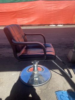 Professional, double-sided salon styling station with chair and built-in electrical