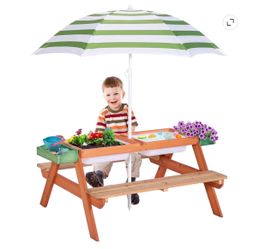 Kids 4 in 1 Picnic activity table outside patio